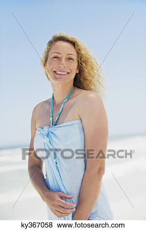 Portrait of a beautiful woman smiling View Large Photo Image Stock Photo - Portrait of a beautiful woman smiling. Fotosearch