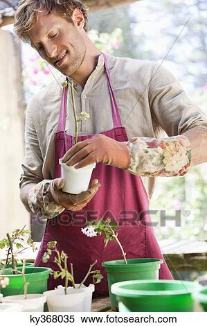 Man gardening and smiling View Large Photo Image Stock Photography - Man gardening and smiling. Fotosearch