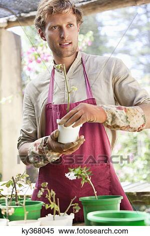 Man gardening and smiling View Large Photo Image Stock Photography - Man gardening and smiling. Fotosearch