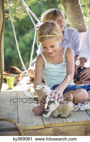 Children playing with toys in tree house View Large Photo Image Stock Image - Children playing with toys in tree house. Fotosearch