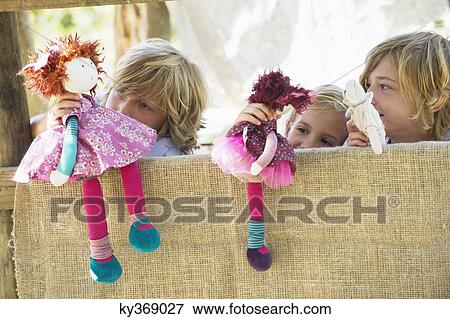 Children playing with toys in tree house View Large Photo Image Stock Photo - Children playing with toys in tree house. Fotosearch