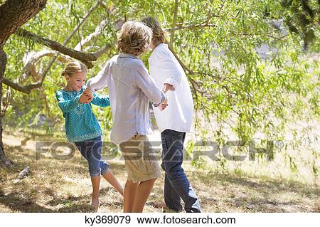 Little children playing outdoors View Large Photo Image Stock Photo - Little children playing outdoors. Fotosearch