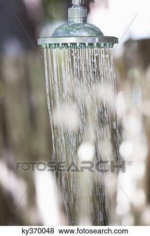 Stock Photo - Close-up of a running shower. Fotosearch