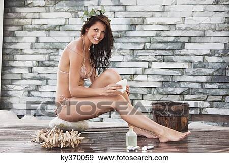 Portrait of a woman in bikini at a spa View Large Photo Image Stock Photo - Portrait of a woman in bikini at a spa. Fotosearch