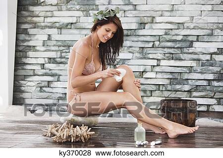 Woman in bikini at a spa View Large Photo Image Stock Photo - Woman in bikini at a spa. Fotosearch