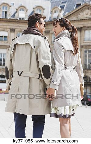 Couple walking on a street, Paris, Ile-de-France, France View Large Photo Image Stock Photography - Couple walking on a street, Paris, Ile-de-France, France. Fotosearch