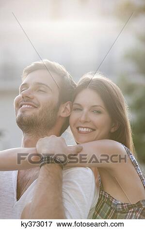 Stock Photo - Close-up of a couple romancing, Paris, Ile-de-France, France. Fotosearch