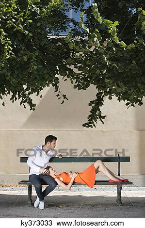 Couple on a bench in a garden, Terrasse De l'Orangerie, Jardin des Tuileries, Paris, Ile-de-France, France View Large Photo Image Stock Image - Couple on a bench in a garden, Terrasse De l'Orangerie, Jardin des Tuileries, Paris, Ile-de-France, France. Fotosearch
