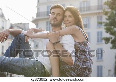 Portrait of a couple romancing, Paris, Ile-de-France, France View Large Photo Image Stock Image - Portrait of a couple romancing, Paris, Ile-de-France, France. Fotosearch