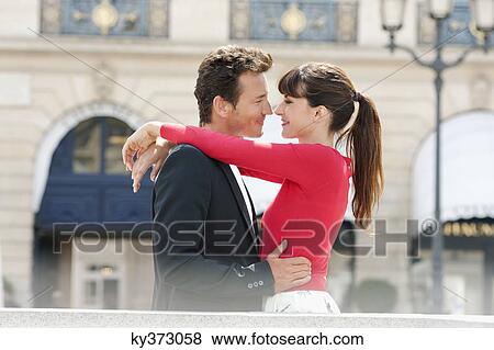 Romantic couple on a street, Paris, Ile-de-France, France View Large Photo Image Stock Photo - Romantic couple on a street, Paris, Ile-de-France, France. Fotosearch