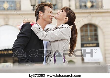 Romantic couple, Paris, Ile-de-France, France View Large Photo Image Stock Image - Romantic couple, Paris, Ile-de-France, France. Fotosearch