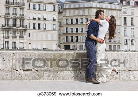 Stock Photo - Romantic couple, Paris, Ile-de-France, France. Fotosearch