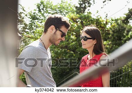 Couple smiling together, Montmartre, Paris, Ile-de-France, France View Large Photo Image Stock Image - Couple smiling together, Montmartre, Paris, Ile-de-France, France. Fotosearch