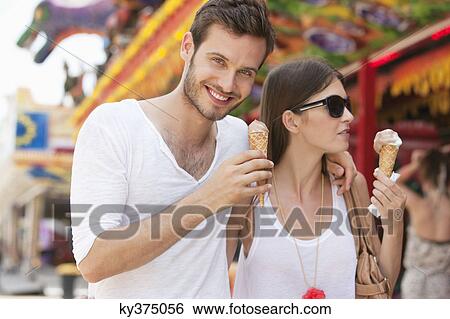 Couple eating ice creams, Paris, Ile-de-France, France View Large Photo Image Stock Photograph - Couple eating ice creams, Paris, Ile-de-France, France. Fotosearch