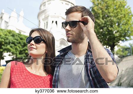 Close-up of a couple, Montmartre, Paris, Ile-de-France, France View Large Photo Image Stock Photograph - Close-up of a couple, Montmartre, Paris, Ile-de-France, France. Fotosearch