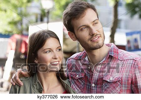 Close-up of a couple smiling, Paris, Ile-de-France, France View Large Photo Image Stock Photograph - Close-up of a couple smiling, Paris, Ile-de-France, France. Fotosearch