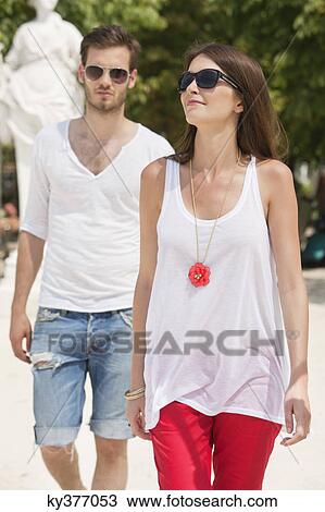 Couple walking, Jardin des Tuileries, Paris, Ile-de-France, France View Large Photo Image Stock Image - Couple walking, Jardin des Tuileries, Paris, Ile-de-France, France. Fotosearch