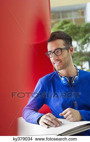 Design professional with his work View Large Photo Image Picture - Design professional with his work. Fotosearch