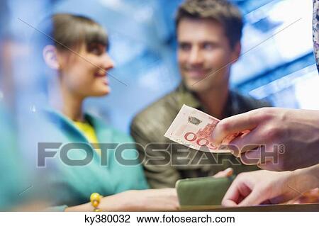 Couple at bank counter View Large Photo Image Stock Image - Couple at bank counter. Fotosearch