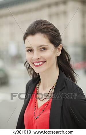 Stock Photo - Portrait of a beautiful woman smiling. Fotosearch