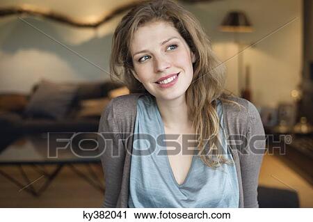 Stock Image - Close-up of a beautiful woman smiling. Fotosearch