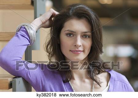 Portrait of a woman smiling View Large Photo Image Stock Photo - Portrait of a woman smiling. Fotosearch