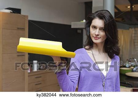 Woman carrying a tray View Large Photo Image Picture - Woman carrying a tray. Fotosearch