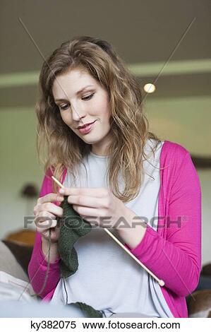 Stock Photography - Woman knitting. Fotosearch