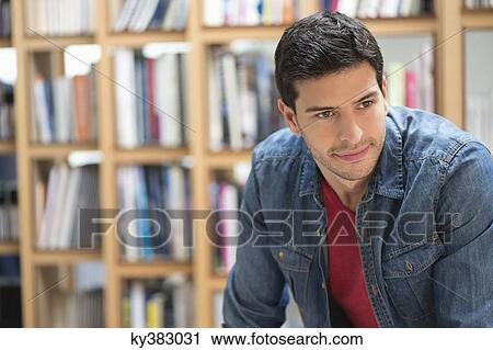 Stock Image - Close-up of a man looking away. Fotosearch
