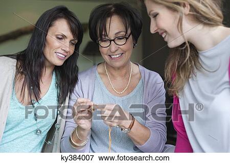 Stock Photo - Women knitting. Fotosearch