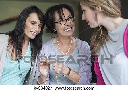 Women knitting View Large Photo Image Stock Photo - Women knitting. Fotosearch