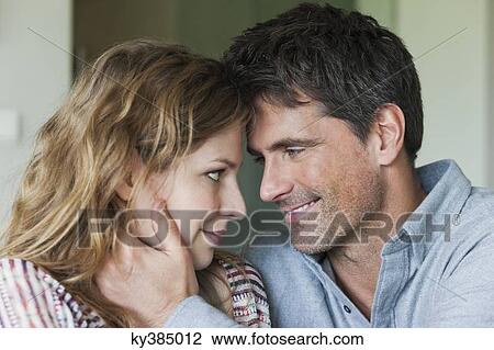 Stock Image - Close-up of a happy romantic couple. Fotosearch