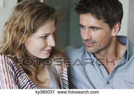 Close-up of a happy romantic couple View Large Photo Image Stock Photo - Close-up of a happy romantic couple. Fotosearch
