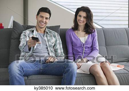 Stock Image - Couple watching television. Fotosearch