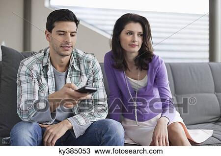 Couple watching television View Large Photo Image Stock Image - Couple watching television. Fotosearch