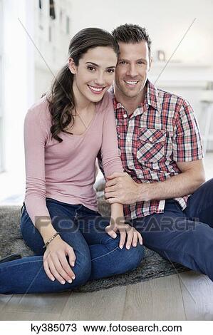 Portrait of a couple smiling View Large Photo Image Stock Image - Portrait of a couple smiling. Fotosearch