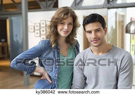 Portrait of a couple smiling View Large Photo Image Stock Image - Portrait of a couple smiling. Fotosearch