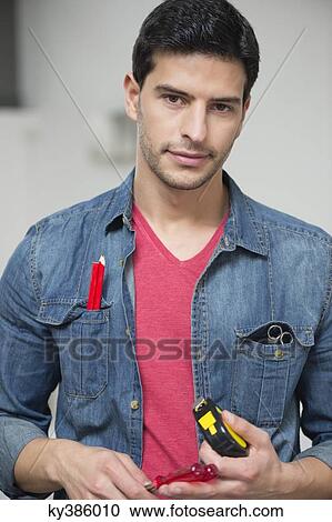 Stock Image - Portrait of a technician. Fotosearch