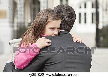 Girl hugging her father View Large Photo Image Stock Image - Girl hugging her father. Fotosearch