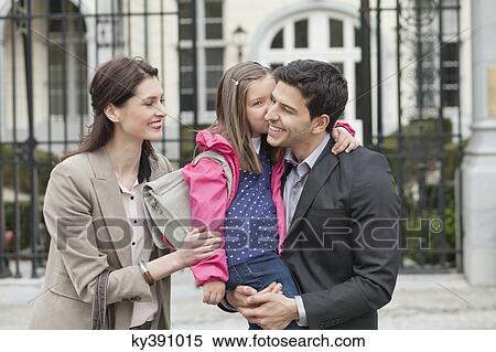 Girl kissing her father View Large Photo Image Stock Photography - Girl kissing her father. Fotosearch