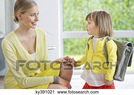 Little girl getting ready for school View Large Photo Image Stock Image - Little girl getting ready for school. Fotosearch