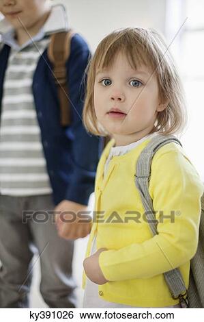 Portrait of a schoolgirl and a schoolboy View Large Photo Image Stock Photograph - Portrait of a schoolgirl and a schoolboy. Fotosearch