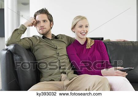 Couple watching television View Large Photo Image Stock Image - Couple watching television. Fotosearch