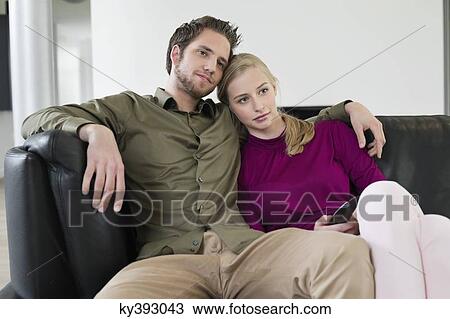 Couple watching television View Large Photo Image Stock Image - Couple watching television. Fotosearch