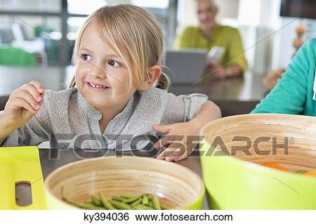 Close-up of a cute girl smiling View Large Photo Image Stock Photograph - Close-up of a cute girl smiling. Fotosearch