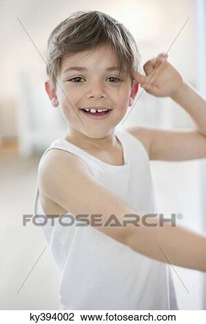 Stock Image - Portrait of a boy smiling. Fotosearch