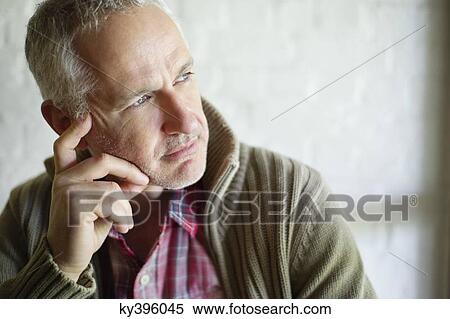 Close-up of a man thinking View Large Photo Image Stock Photography - Close-up of a man thinking. Fotosearch