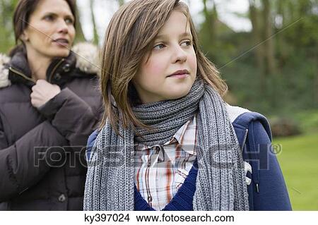 Woman with her daughter in a park View Large Photo Image Picture - Woman with her daughter in a park. Fotosearch