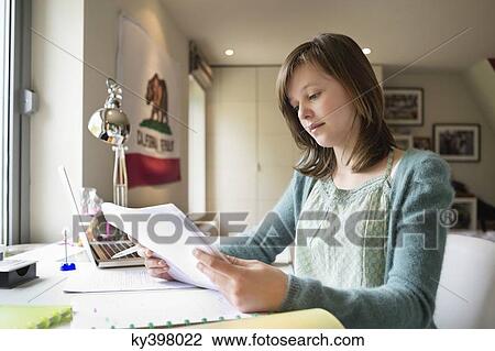 Girl studying at home View Large Photo Image Stock Image - Girl studying at home. Fotosearch
