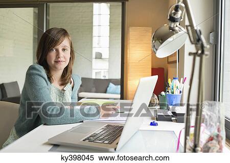 Girl studying at home View Large Photo Image Stock Photography - Girl studying at home. Fotosearch